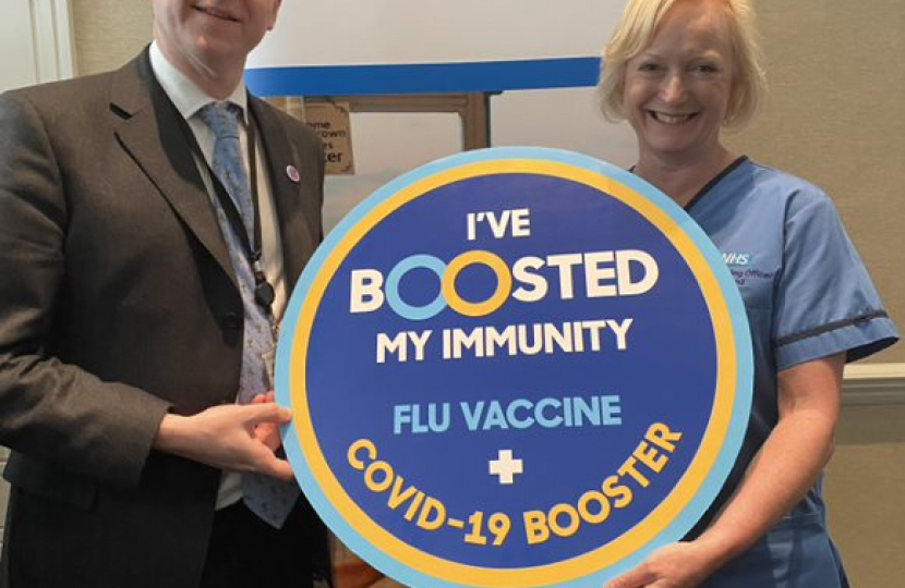 Robin flu jab with Ruth May, Chief Nurse Officer NHS 