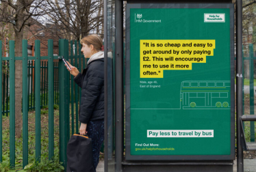 A bus stop with the text "Its so easy and cheap to get around for £2. This will encourage me to use the bus more often"